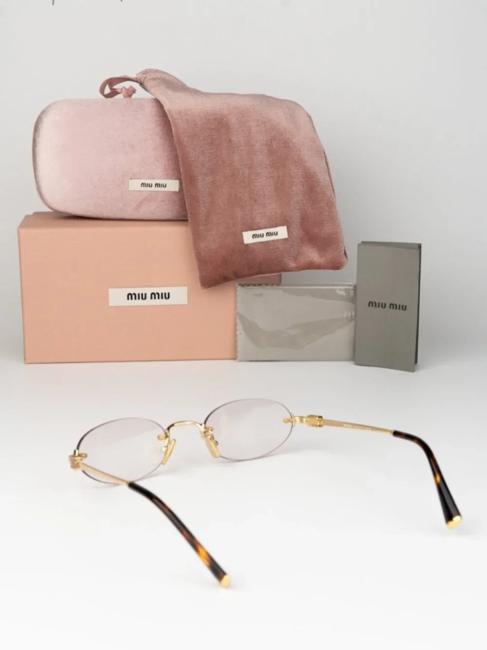 Miu Miu Women Eyeglasses Gold Clear Oval Rimless MUA54S 5AK08N NEW AUTHENTIC